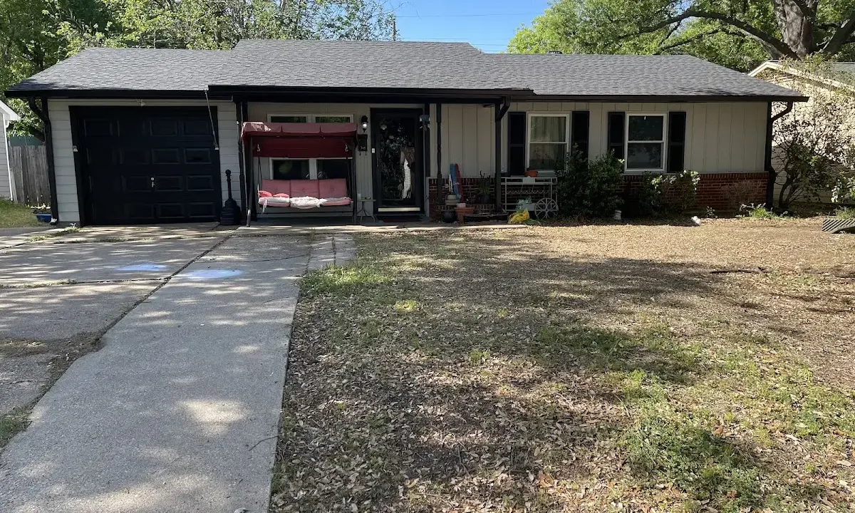 Asphalt Shingle Roof Repair crew at work on a residential roof in Candler-McAfee